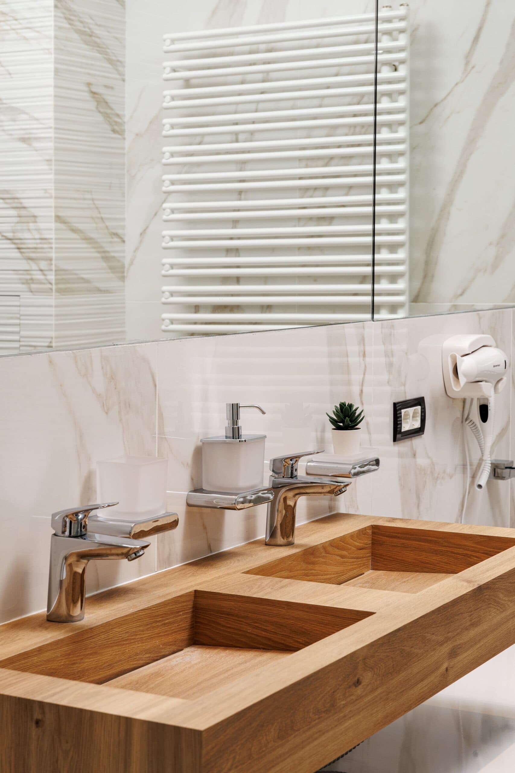 Luxurious bathroom with wooden sinks