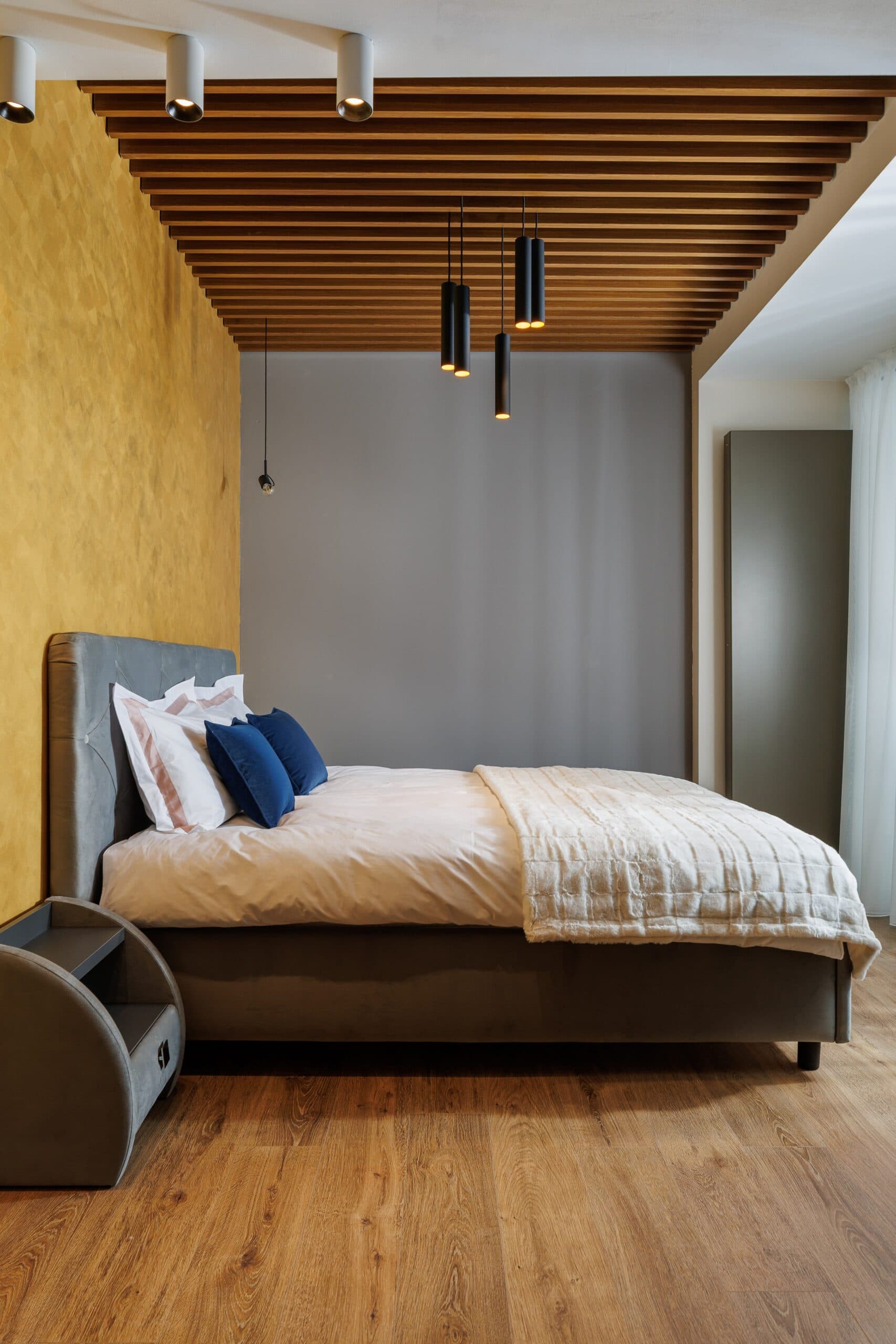 Modern bedroom with wooden ceiling