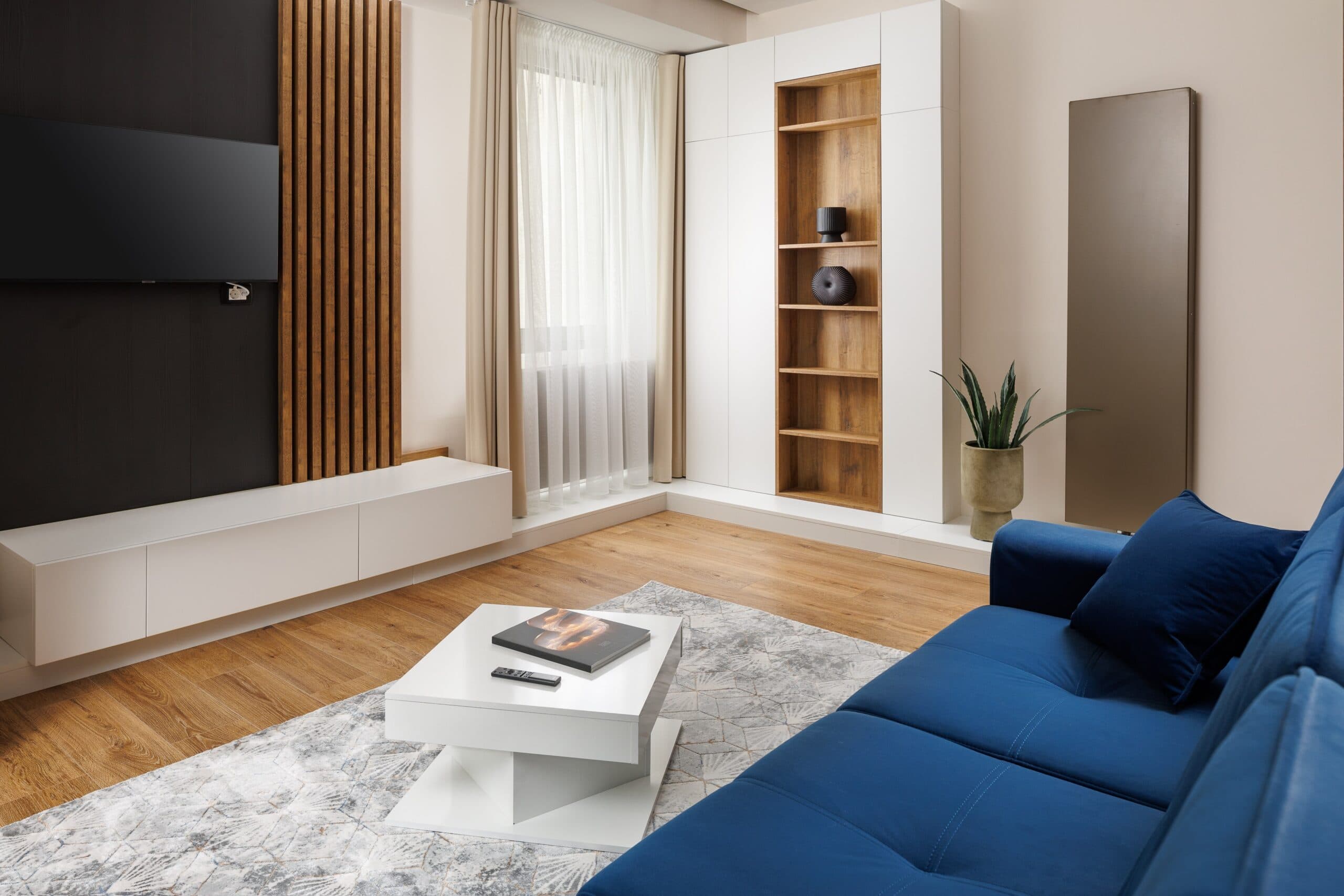 Modern Aparthotel with Blue Couch